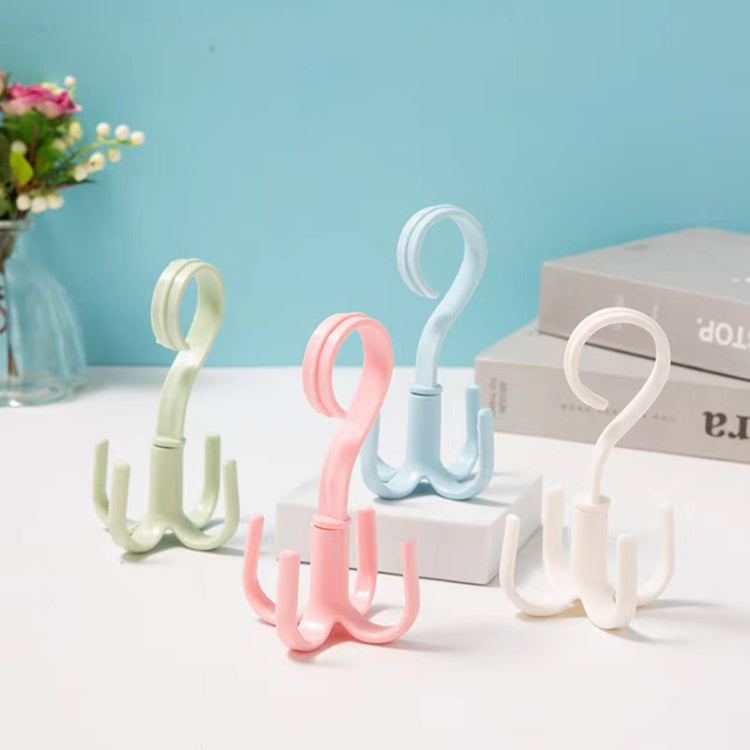 Rotating belt hooks with four-prong ring design in pastel blue, pink, and white