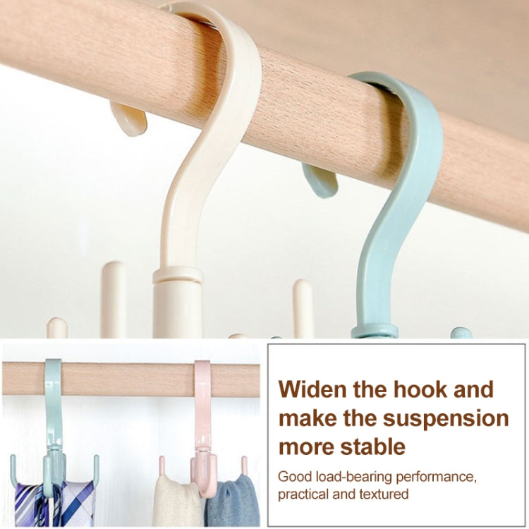 Four-claw ring belt hook on a light wood bar, white and light blue plastic