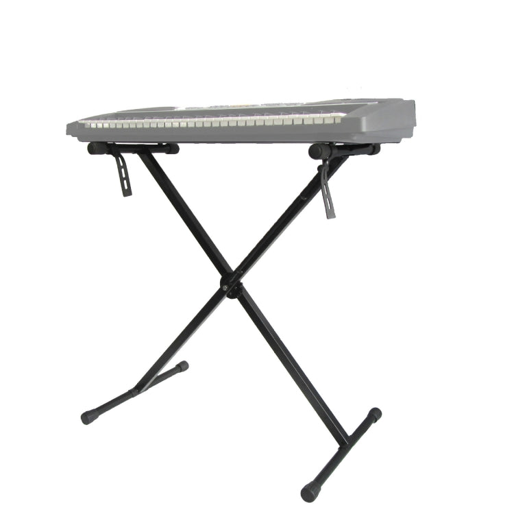 Black X-shaped organ stand with folding legs and rubber end caps
