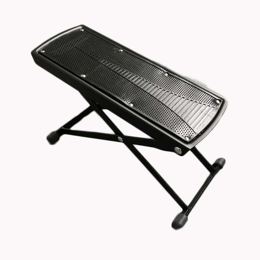 Guitar footrest with textured non-slip panel on black X-frame, tilted view