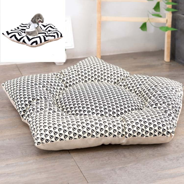 Pet sleeping mat bed with black-and-white geometric triangle pattern cover and beige base