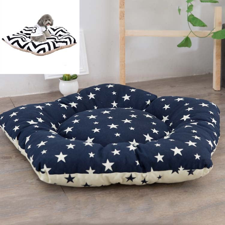 Dog sleeping mat bed with dark navy stars on white dots and cream underside trim