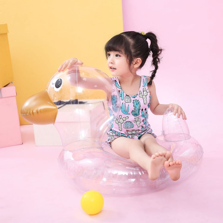Transparent duck pool ring with golden beak; child seated holding the float