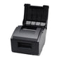 Dot matrix invoice printer with top cover open and inside paper feed guides