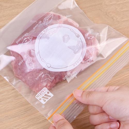 Thick clear sealed food storage plastic bag with orange stripes and circular label