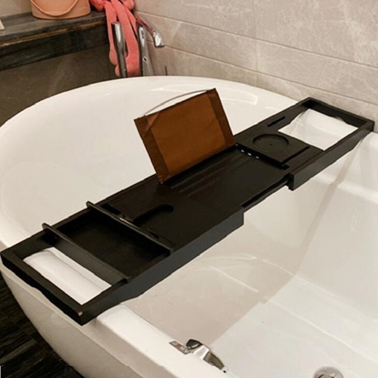 Black bathtub shelf rack extended on a white tub with open side compartments
