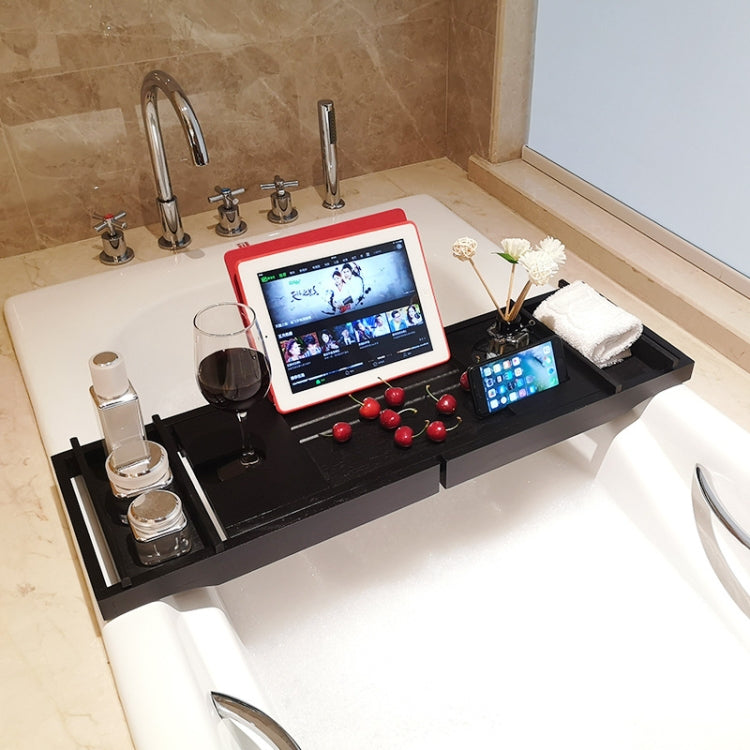 Retractable bathtub shelf rack with black trays, glassware, and tablet display