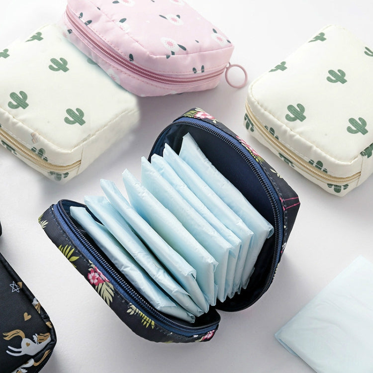 Open square zip pouch sanitary napkin storage with folded light-blue pads inside