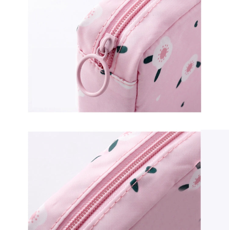Pink square zip pouch for sanitary napkin storage, close-up of zipper and stitching
