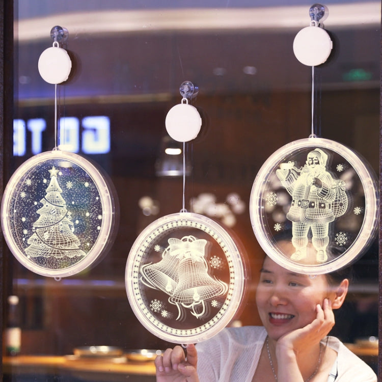 Hanging round LED holiday lights showing tree, Santa, and ornament designs