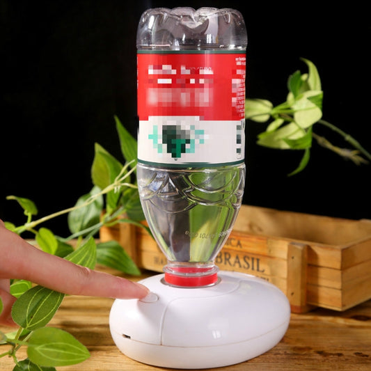 White portable ultrasonic air humidifier with clear bottle reservoir and red base ring