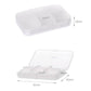 Compact white pill box with clear-lid window and snap-shut hinge, rectangular shape