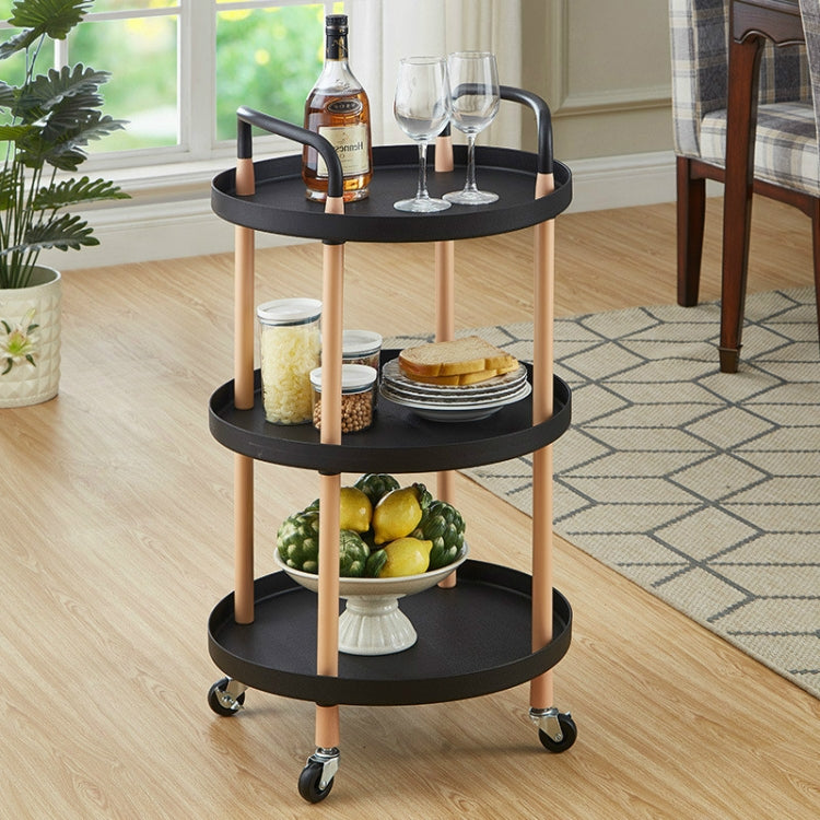 Three-tier round storage trolley with black shelves, light wood legs, curved handles, wheels