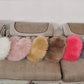 Heart-shaped faux fur cushion pillow set on sofa in assorted colors