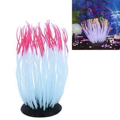 Coral tree aquarium ornament with pink tips and light blue translucent strands, black base
