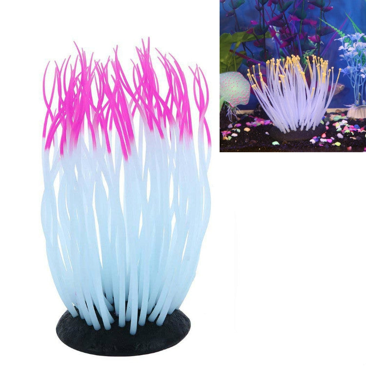 Coral tree aquarium ornament with magenta pink tips and light blue strands, black base