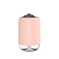 Pink portable car humidifier with black nozzle top and base, front view