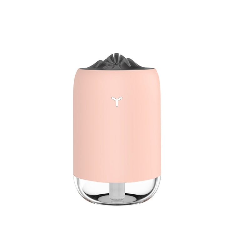 Pink portable car humidifier with black nozzle top and base, front view