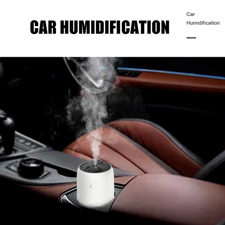 Pink car humidifier emitting mist with night-light glow
