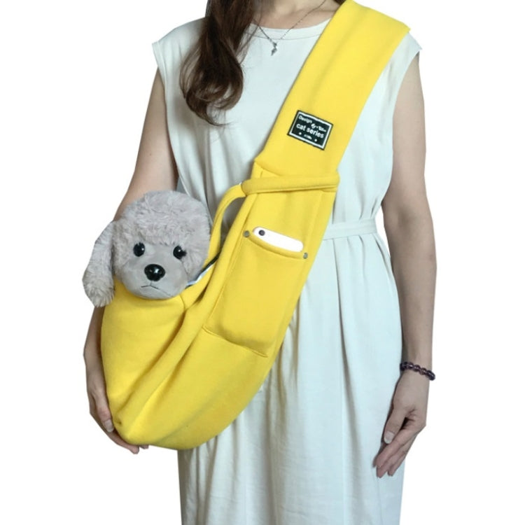 Cotton pet messenger shoulder bag in bright yellow with front pocket, carrying plush dog