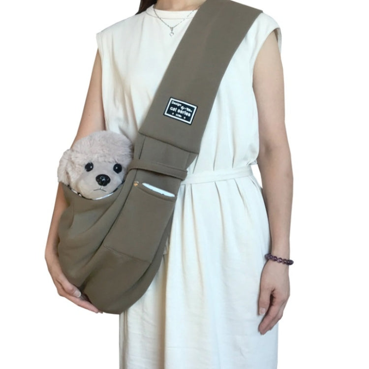 Cotton pet messenger shoulder bag in taupe with front pocket, carrying plush dog