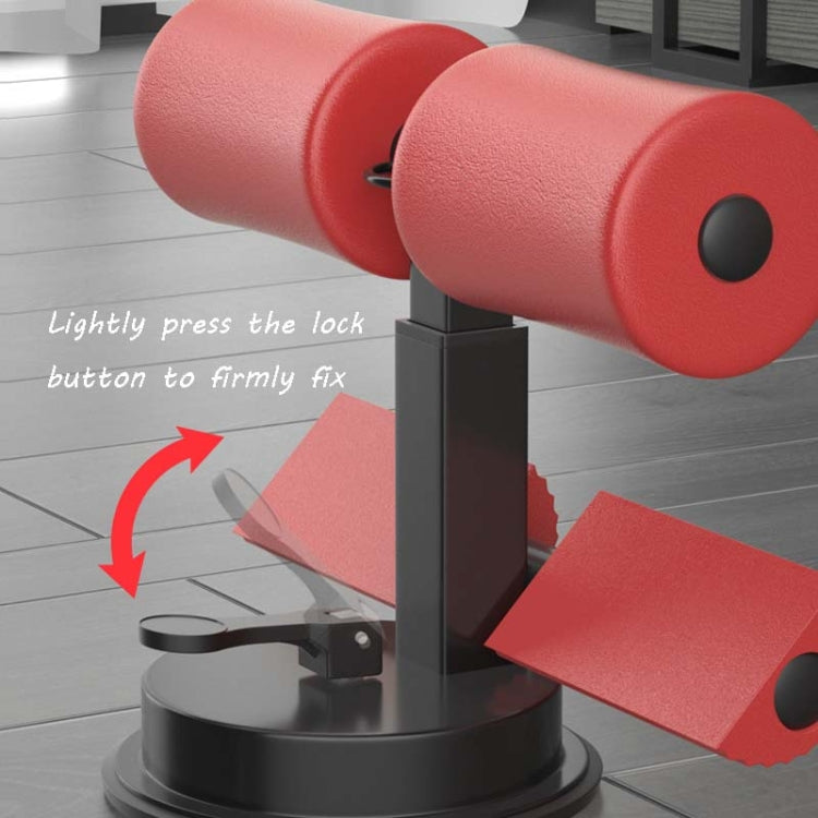 Red foam handles and black lock button on suction-cup abdominal curler stand.