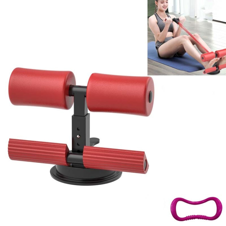 Red suction-cup abdominal curler sit-up aid with foam rollers and black base.