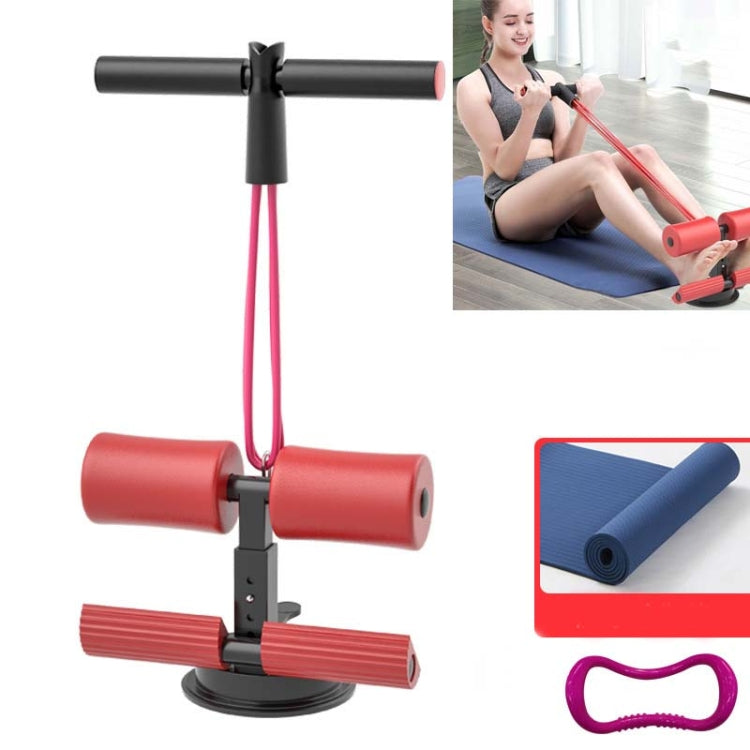 Red abdominal curler sit-up aid with blue yoga mat and pull strap