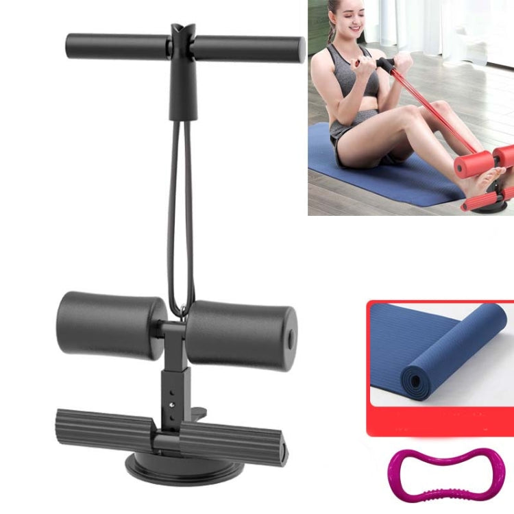 Black abdominal curler sit-up aid with blue yoga mat and pull strap