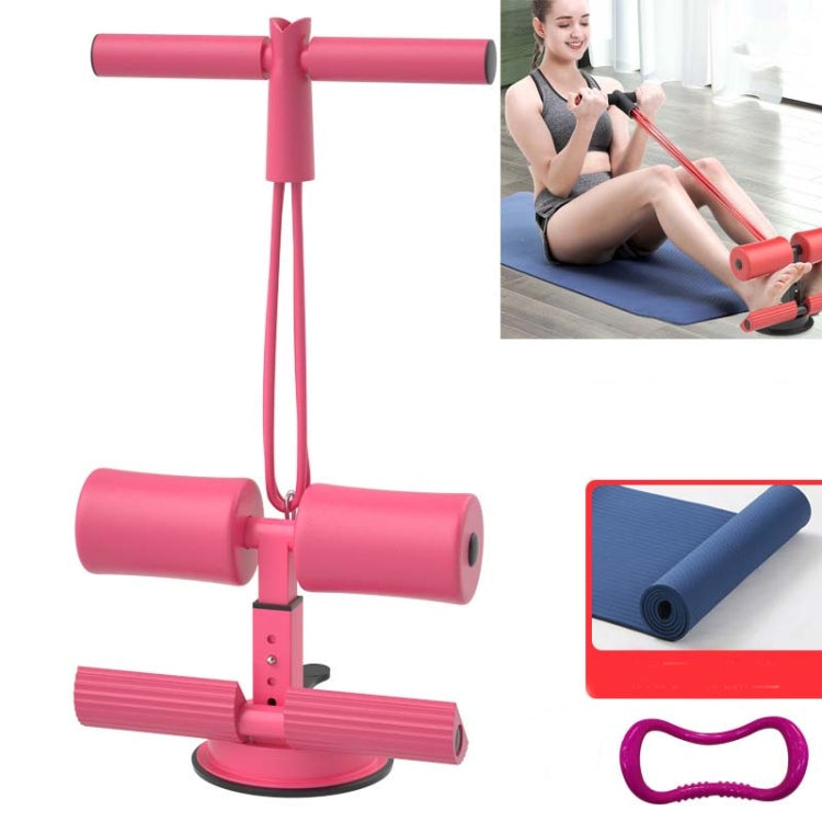 Pink abdominal curler sit-up aid with blue yoga mat and pull strap