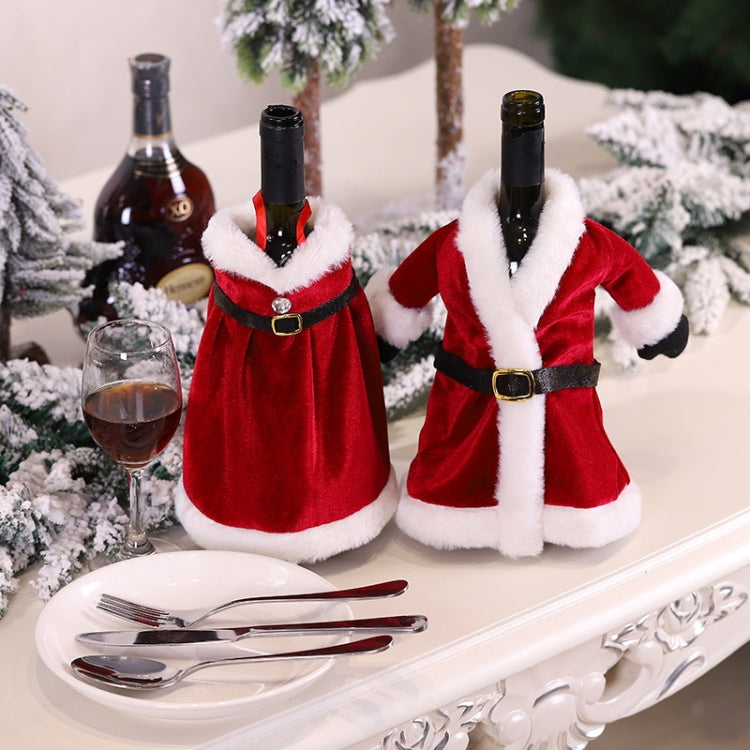 Red velvet wine bottle covers with white fur trim and black belts, two different styles.
