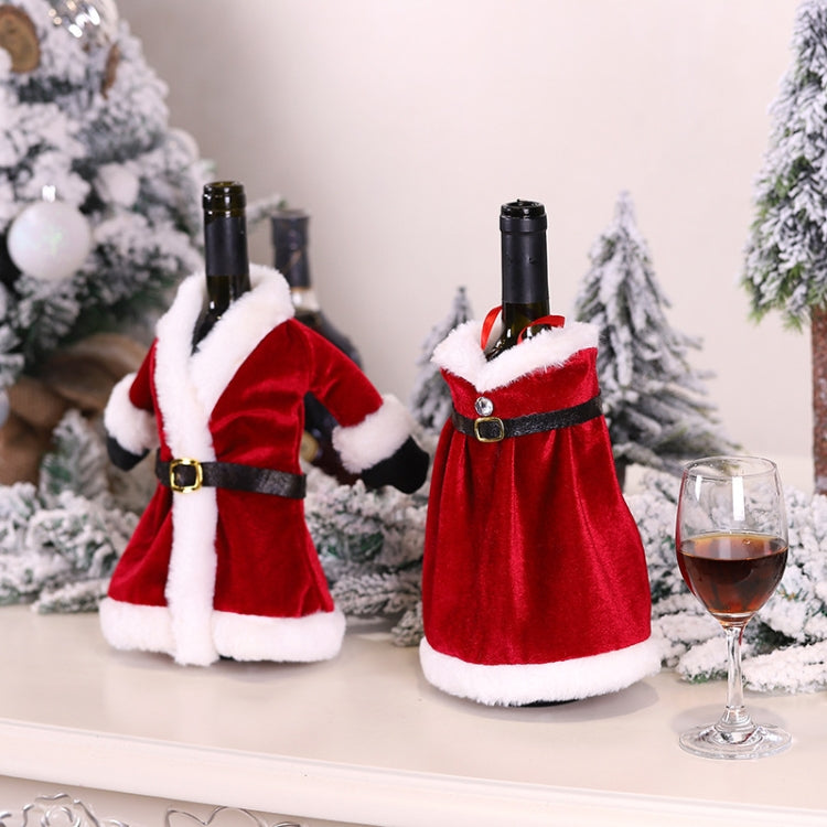Red velvet wine bottle dress and skirt covers with white trim, black belt, and buckle.