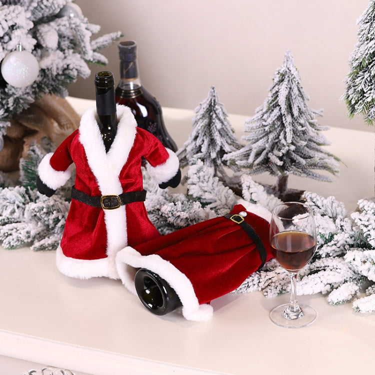 Red velvet wine bottle dress cover with white trim, black belt, and gold buckle.