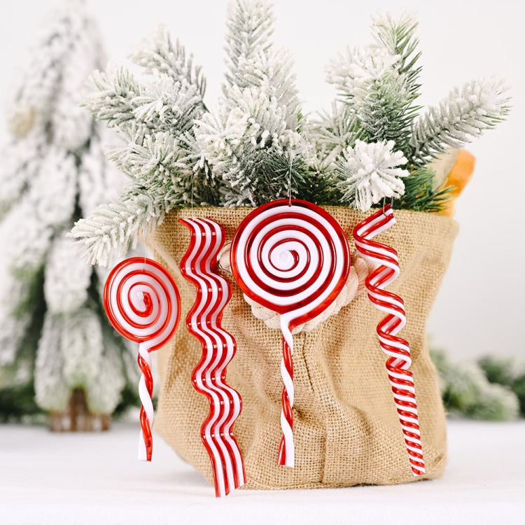 Red and white candy swirl Christmas ornaments in a burlap pouch