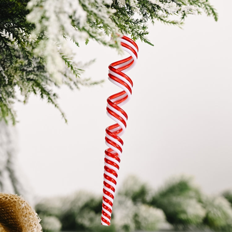 Tall red and white striped swirled candy Christmas ornament with hanging top