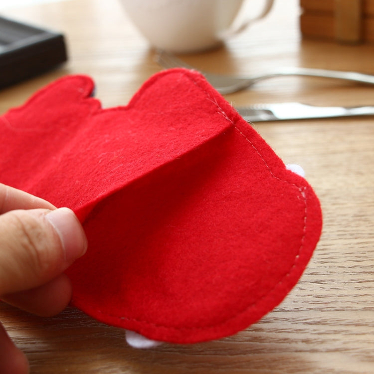 Close-up of red felt knife and fork cover fabric with stitched edge