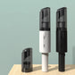 Handheld vacuum cleaners in black and white with compact charging base