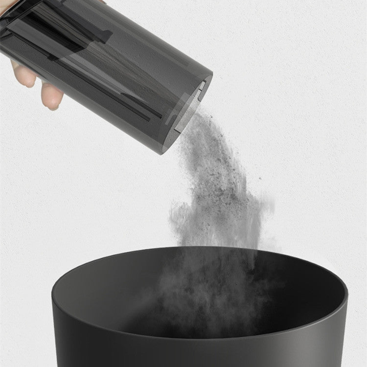 Handheld vacuum cleaner with nozzle releasing dust from transparent collection chamber