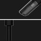 Black handheld vacuum cleaner nozzle close-up with compact charging port
