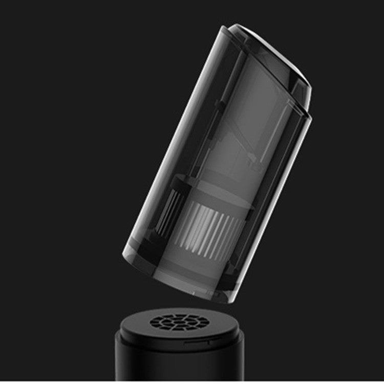 Black handheld vacuum cleaner with transparent bin and separate top cap