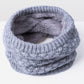 Light gray knit infinity scarf with thick ribbed texture and soft gray fleece lining