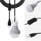 USB camping bulb light with white globe, black inline switch, and USB charging cable