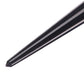 Close-up of taper reamer pointed tip showing black grooves and metal surface
