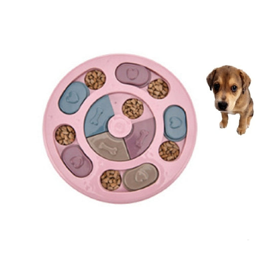 Pink round dog food puzzle turntable with sliding treat compartments and central spinner