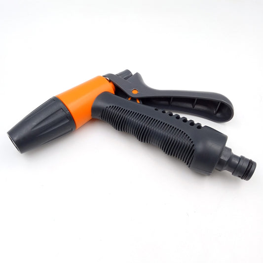 Garden hose nozzle sprinkler with textured grip, orange collar, and outlet nozzle