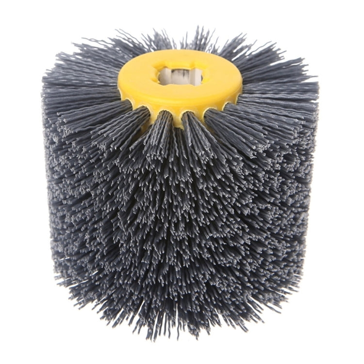 Abrasive wire wheel with yellow hub and gray bristle disc, front view