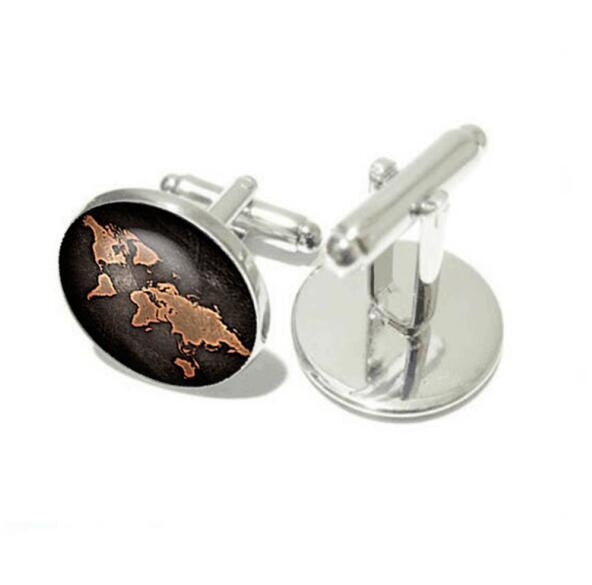 Silver-tone world map cufflinks, round black face with bronze-toned continents