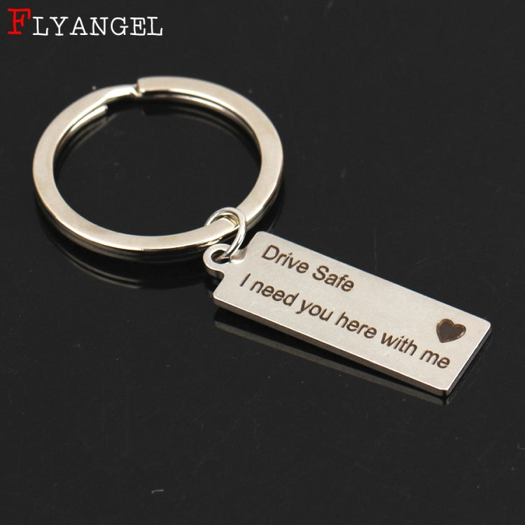 Silver keyring with engraved bar tag, “Drive Safe I need you here with me” and heart