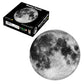 Round jigsaw puzzle with gray moon surface artwork, circular lunar design