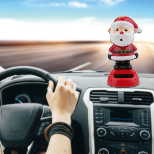 Red Santa Claus solar dashboard decoration with white beard and black boots on base